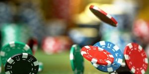 Casino Chips Falling onto Table