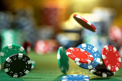 Casino Chips Falling onto Table