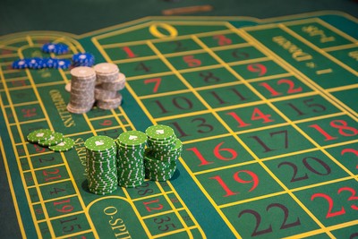 Casino Chips on Roulette Racetrack