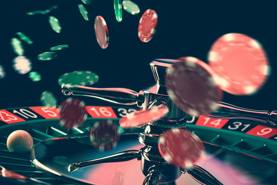 Chips Falling on Roulette Wheel