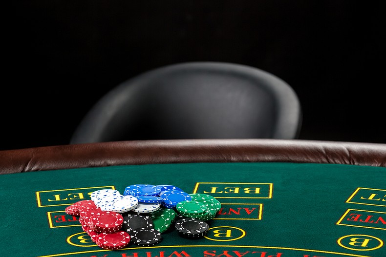 Empty Chair at Poker Table