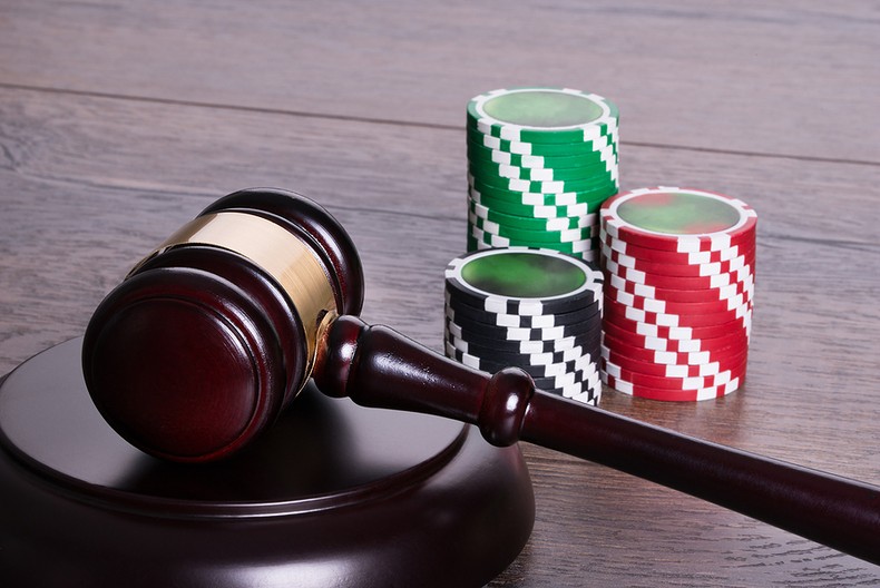 Gavel with Stacks of Casino Chips