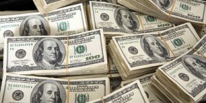 Piles of 100 Dollar Bills