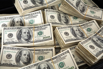 Piles of 100 Dollar Bills