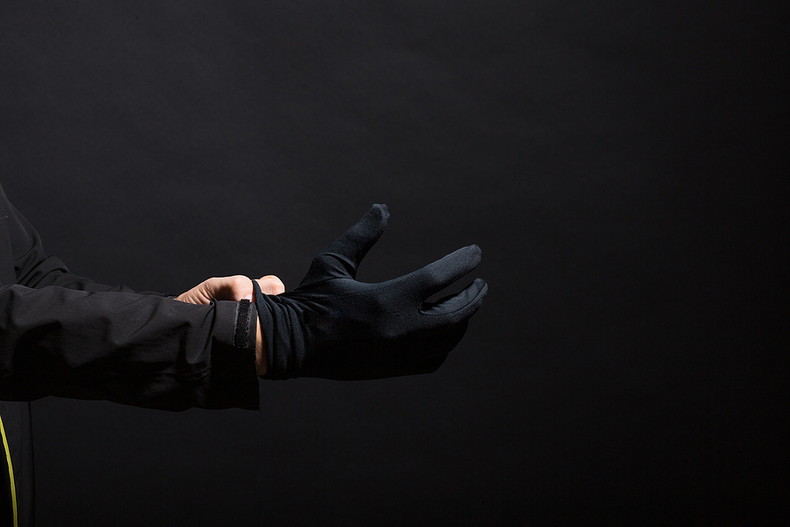 Robber Putting on Black Glove