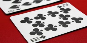 Split Tens on Red Felt Table