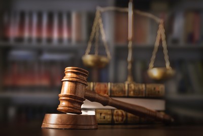 Vintage Gavel Against Scales